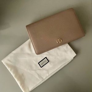 Gucci nude wallet on gold chain with mirror. Comes with dust bag.